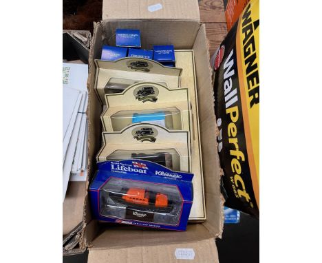 A collection of boxed die cast model vehicles including Corgi, Days Gone By etc. 