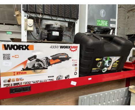 A 400w Workx electric saw, boxed, appears unused, and an Exakt SP180 planer/sander, boxed and appears unused 