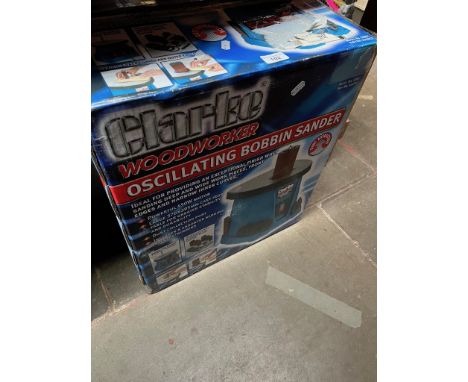 A boxed Clarke oscillating bobbin sander ( unused ). 