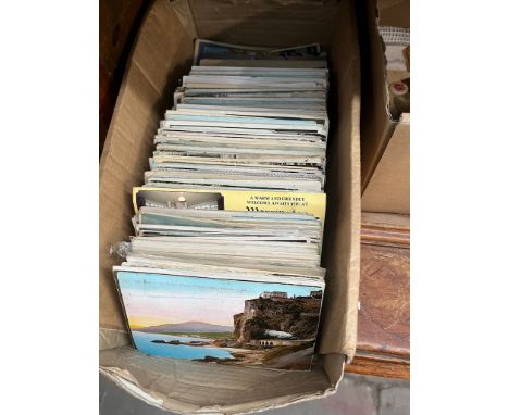 A box of vintage postcards 