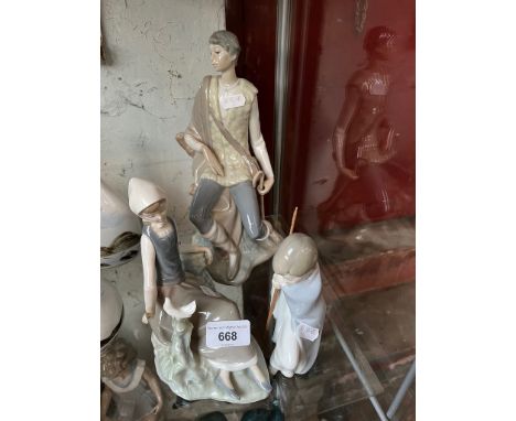 Three Lladro figurines. Seated girl with bird on bough; Girl with staff (as found); Girl seated with crook/walking stick 