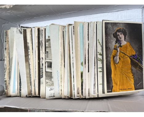 A box of vintage postcards 