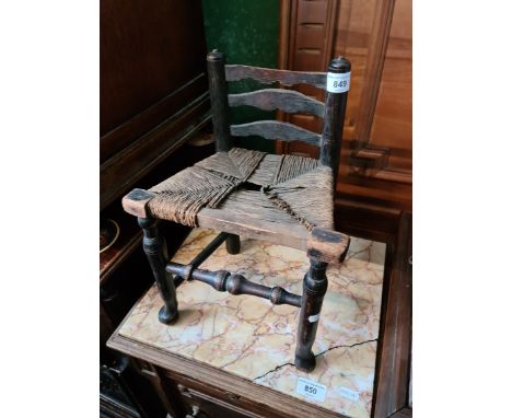 An apprentice miniature Billinge ladder back and rush seated chair, height 36cm. 
