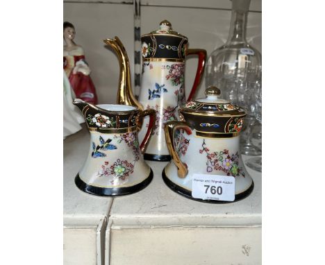 A Japanese porcelain 3 piece tea set with enamel decoration. 