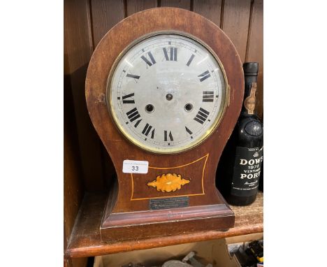 A 1930's German balloon shaped mantel clock with mother of pearl inlay and hallmarked silver plaque with description, with pe