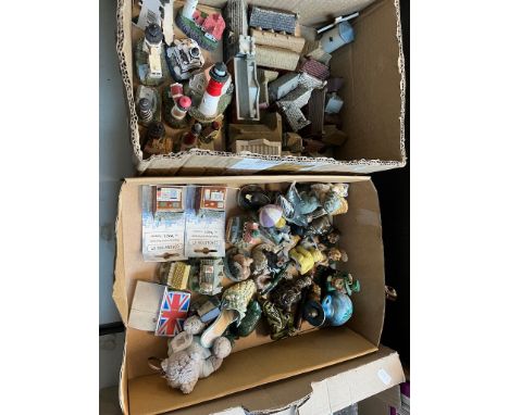 Two boxes of ornaments including Wade Whimsies Village models, animal, light houses etc. 
