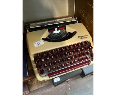 A vintage Olympia Splendid 33 portable typewriter. 