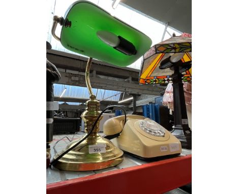 A bankers desk lamp and a vintage telephone 