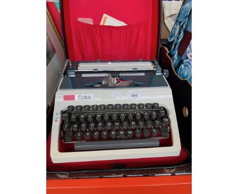 A vintage Daro Erika portable typewriter. 