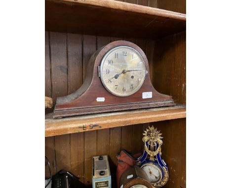 A domed "Napoleon" mantel clock. 
