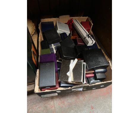 A box of empty vintage jewellery boxes. 