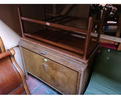 A vintage bedding box and a mid 20th century tile top coffee table. 