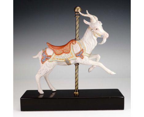 This finely detailed porcelain carousel goat figurine by Cybis features a dynamic pose with one leg lifted, as if captured mi