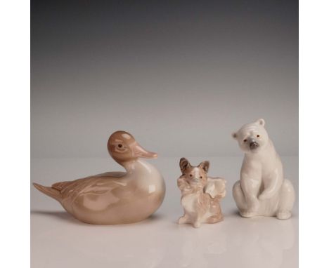 A charming trio of high-gloss Lladro porcelain figurines featuring animals in lifelike poses. This lot includes a serene duck