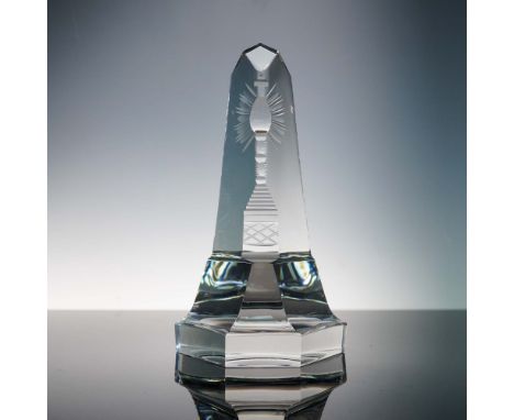 This striking Val St Lambert crystal obelisk sculpture showcases a masterful interplay of form and light, featuring a tall, f