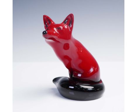 Royal Doulton flambe glazed porcelain figurine depicting a seated fox, model, Style Two. The fox is rendered in rich flambe r