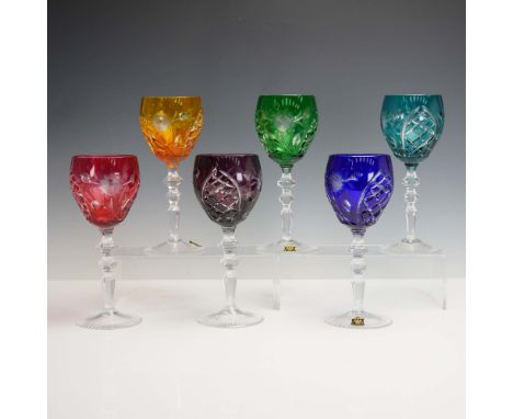 A vibrant 6-piece set of E&amp;R Golden Crown hand cut crystal wine goblets featuring a striking array of colors including re