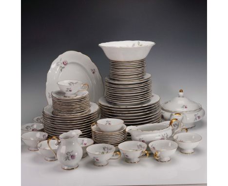 A charming 86-piece porcelain china dinner service by Bavaria Fredericksburg of West Germany, featuring a delicate rose garla