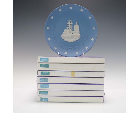 A collection of seven Wedgwood pale blue jasperware plates commemorating key events in American independence history. Each pl