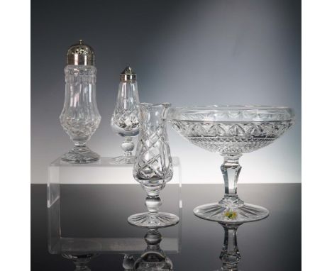 This 4-piece tableware set by Waterford Crystal blends function with timeless elegance, featuring brilliant hand-cut designs 
