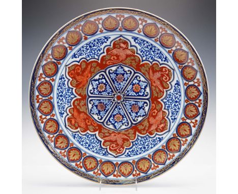 This striking Andrea by Sadek charger plate showcases the opulent Gold Imari style, a Japanese porcelain tradition known for 
