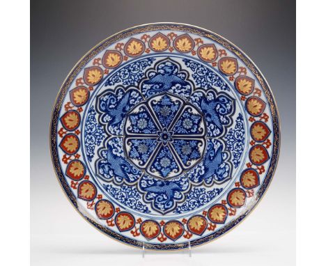 This bold Andrea by Sadek charger plate exemplifies the traditional Gold Imari aesthetic, rendered here in a vivid palette of