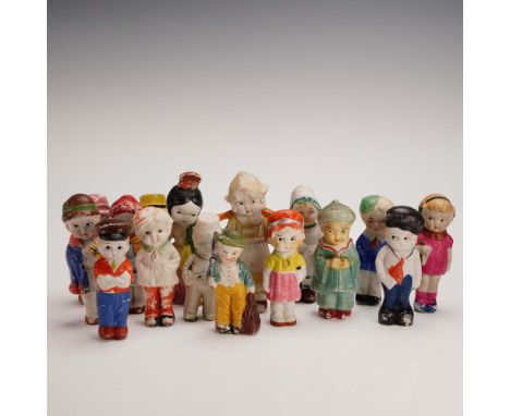 Grouping of sixteen vintage bisque porcelain dolls, each painted in polychrome and modeled as a child in various outfits and 