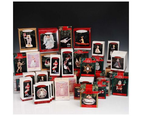 A charming 40-piece collection of Hallmark Keepsake Christmas ornaments, featuring a broad mix of themes and characters that 