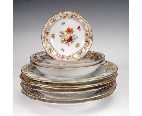 This 10-piece assortment of fine porcelain from Schumann Arzberg Germany features the Empress Dresden Flowers pattern, a rich