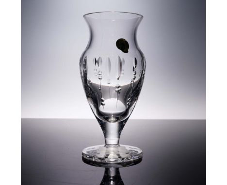 This graceful Waterford Crystal Ballet Blossom footed vase combines classic elegance with modern artistry. Featuring petal-li