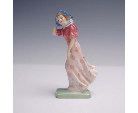 Hand-painted bone china miniature depicts a young woman holding her wide-brimmed blue hat against the wind, dressed in a rose