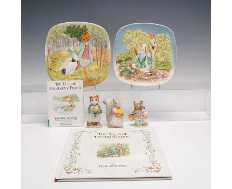 Seven-piece collection of Beatrix Potter-themed collectibles including two hardcover books: "The Tale of Peter Rabbit" and "T
