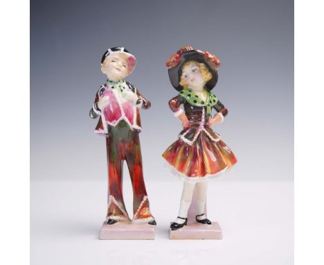 Pair of hand-painted Royal Doulton porcelain figurines depicting a boy and girl in traditional pearly attire, both designed b