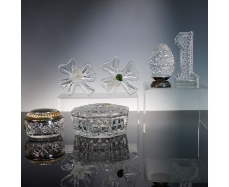 This delightful 7-piece collection of Waterford Crystal showcases a variety of decorative and functional items, each displayi
