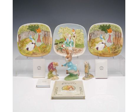 A ten-piece collection featuring Beatrix Potter-themed ceramic collectibles and related ephemera. Included are three Beswick 