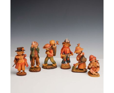 Italy: Anri, mid-to-late 20th century. A lively set of six hand-carved and hand-painted wooden figurines designed by J. Ferra