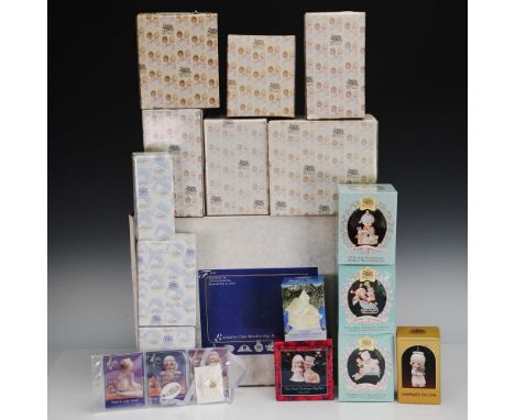 This 16-piece collection of Precious Moments figurines showcases a delightful range of themes, including holiday cheer, child