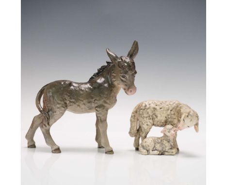This lot features two charming Goebel porcelain figurines crafted in West Germany. The first is a lifelike depiction of a don