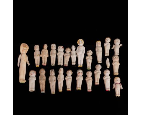 A delightful collection of 24 pre-war miniature bisque dolls, most marked "Japan" on the reverse, dating to the 1920s -1940s.