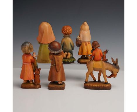 Italy: Anri, mid-to-late 20th century. A soulful collection of six hand-carved and hand-painted wooden figurines designed by 