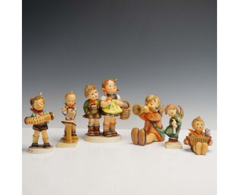 Collection of six figurines featuring musical performances, angelic characters, and scenes of friendship. Highlights include 