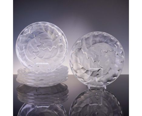 A stunning 6-piece set of Lalique crystal dinner plates in the Chene pattern, featuring a graceful swirling motif of stylized