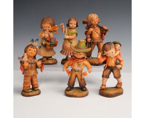 Italy: Anri, mid-to-late 20th century. A delightful grouping of six hand-carved, hand-painted wooden figurines designed by Sp