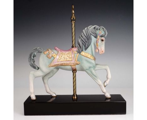 Finely crafted in hand-painted porcelain, this Cybis Carousel Horse figurine showcases the elegance and charm of vintage caro
