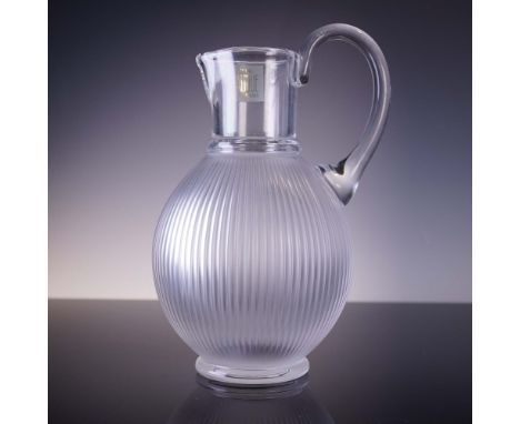 This elegant crystal pitcher by Lalique features a rounded ovoid body with finely ribbed frosted crystal and a contrasting cl