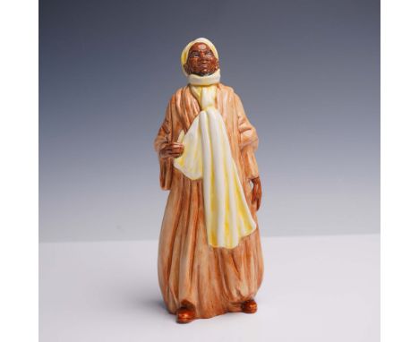 The figure depicts a man in long flowing robes with detailed folds, rendered in tones of tan and brown, paired with a white a