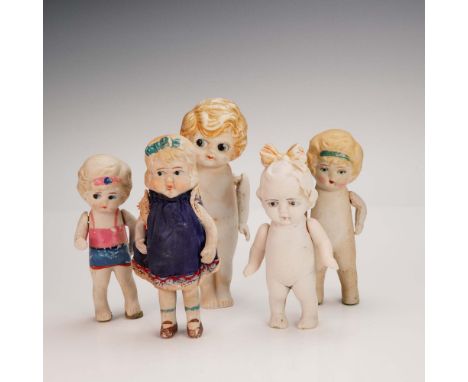 Set of five vintage bisque dolls, marked "Made in Japan" on the back. Each doll features molded and hand-painted facial featu