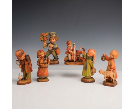 Italy: Anri, mid-to-late 20th century. A whimsical set of six hand-carved and hand-painted wooden figurines designed by J. Fe