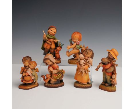 Italy: Anri, mid-to-late 20th century. A lively and heartwarming set of six hand-carved and hand-painted wooden figurines cre