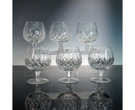 Made by the distinguished Irish crystal house Waterford, this set of six tall brandy glasses features the Platinum Lismore pa